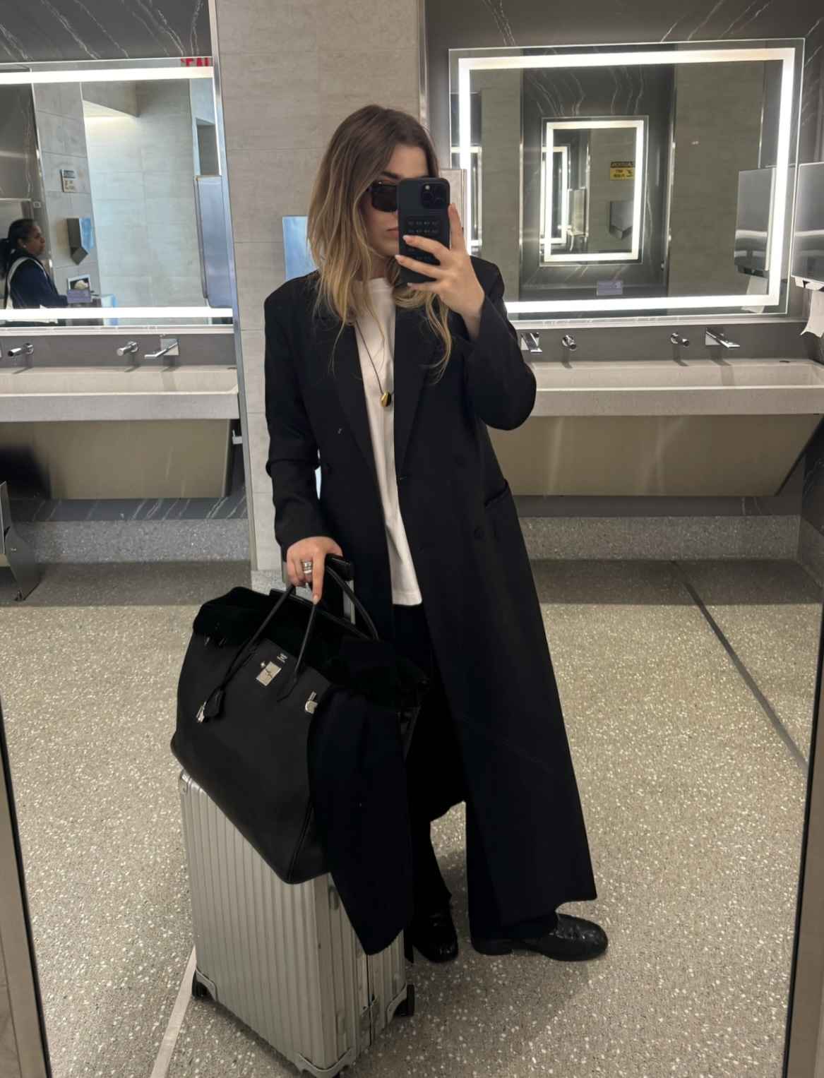 Christina Grasso wearing airport outfits