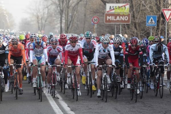 The peloton leaves Milan behind on the long road to San Remo.
