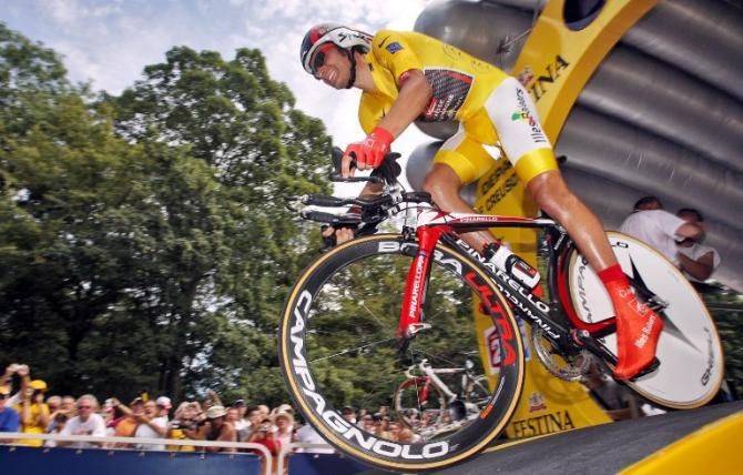 2006 Tour de France leader Oscar Pereiro (Caisse d'Epargne-Illes Balears) rolls out of the start house for the penultimate stage ITT. Floyd Landis would take the yellow jersey from Pereiro and ride with it into Paris, but the Spaniard would ultimately be named the 2006 winner after Landis was stripped of the title