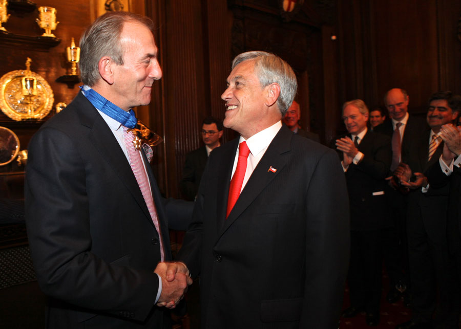 Michael Cox and Chilean president Sebastian Pinera