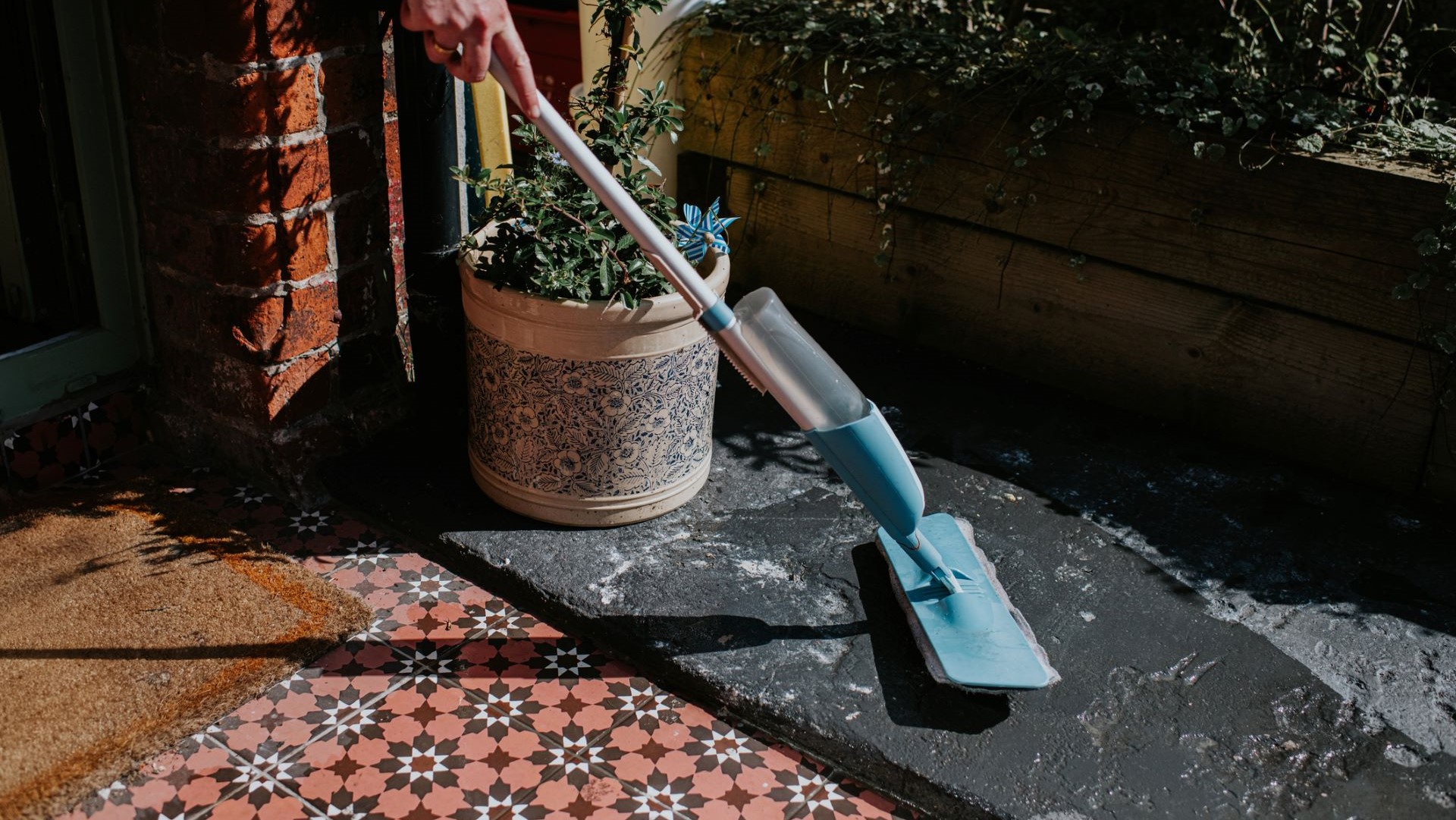 Mop being used outdoors