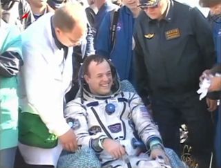 NASA astronaut Ron Garan is all smiles after landing back on Earth aboard a Russian Soyuz TMA-21 spacecraft following a 5 1/2-month mission to the International Space Station.