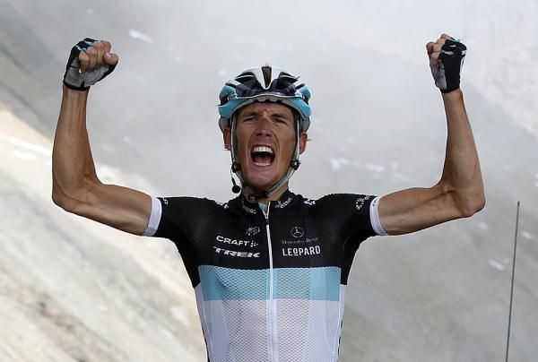 Andy Schleck lets out a victory roar
