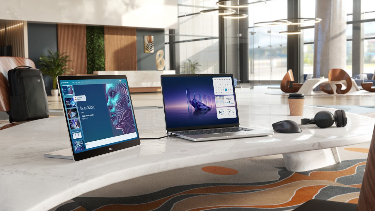 Dell 14 Plus Laptop on a large desk