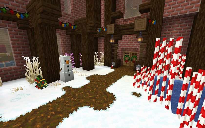 An image of a Minecraft Christmas pack installed showing snowmen and red and white poles 