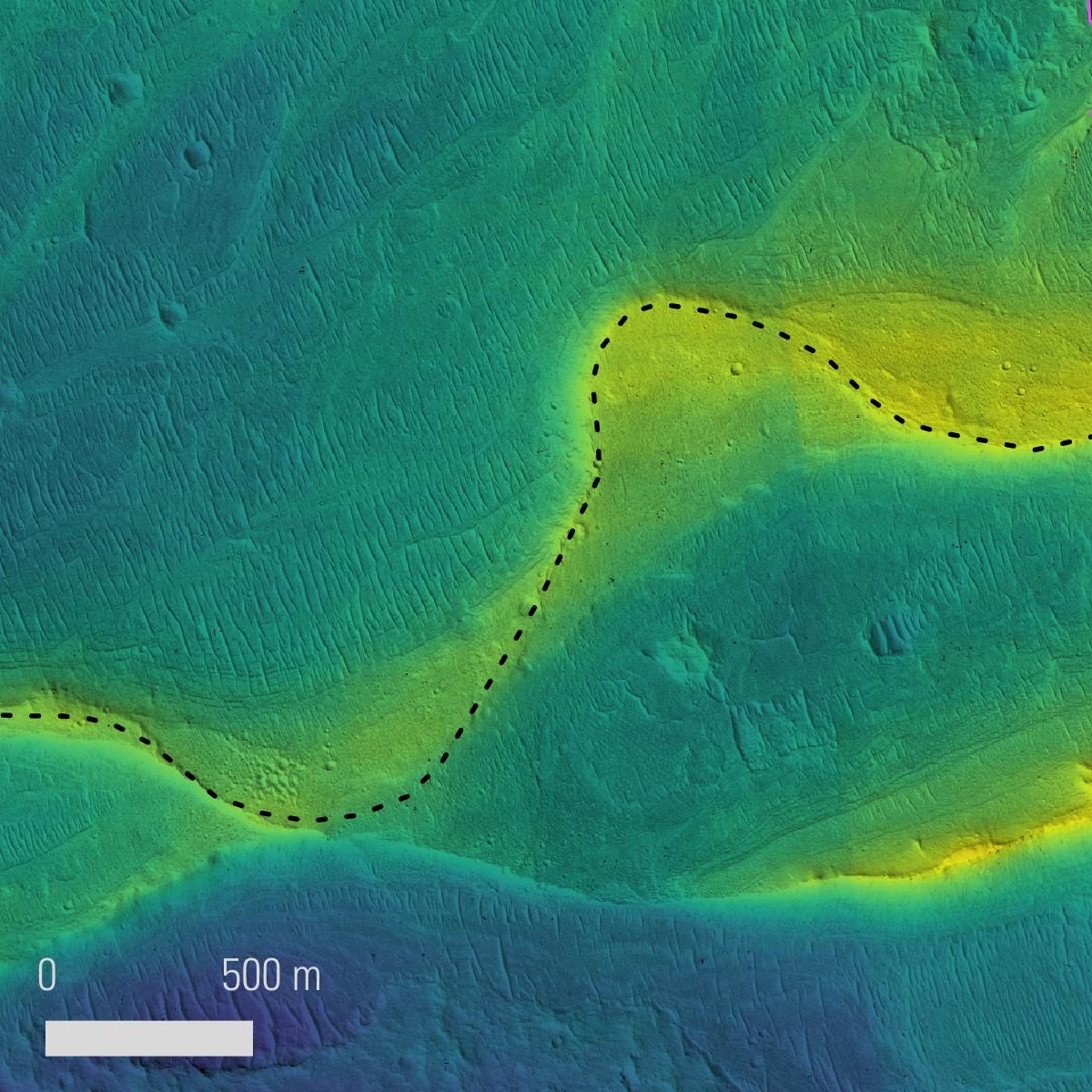 Marked photo of a preserved river channel on Mars, taken by NASA&#039;s Mars Reconnaissance Orbiter, with color overlaid to indicate elevation (blue is low, yellow is high.) The range of elevation in the scene is about 115 feet (35 meters).