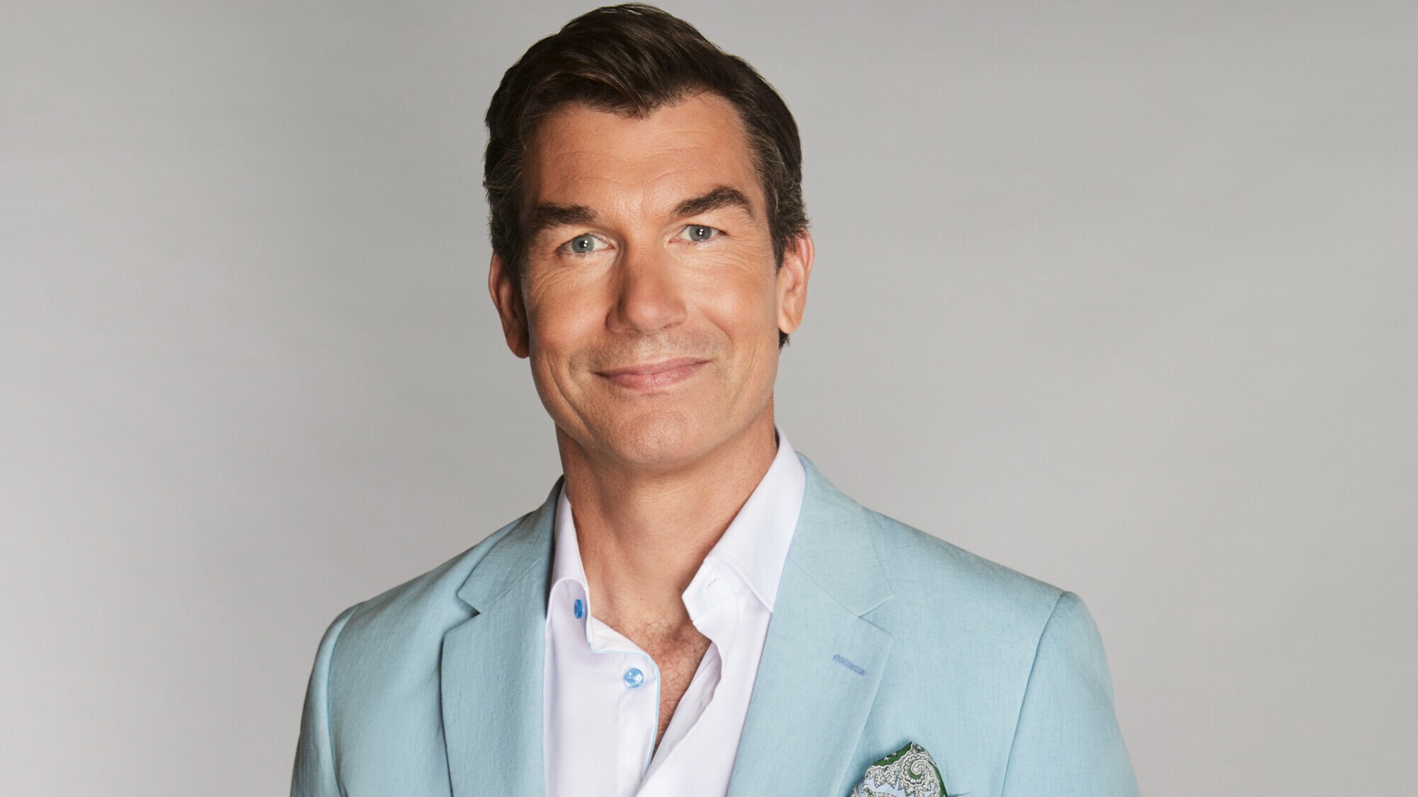 Jerry in a suit in a professional headshot. 