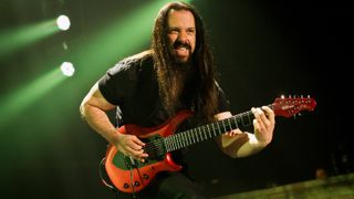 John Petrucci playing live with a 7-string guitar