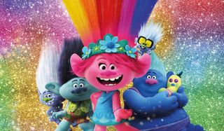 Trolls World Tour Poppy and friends in front of a glittery background