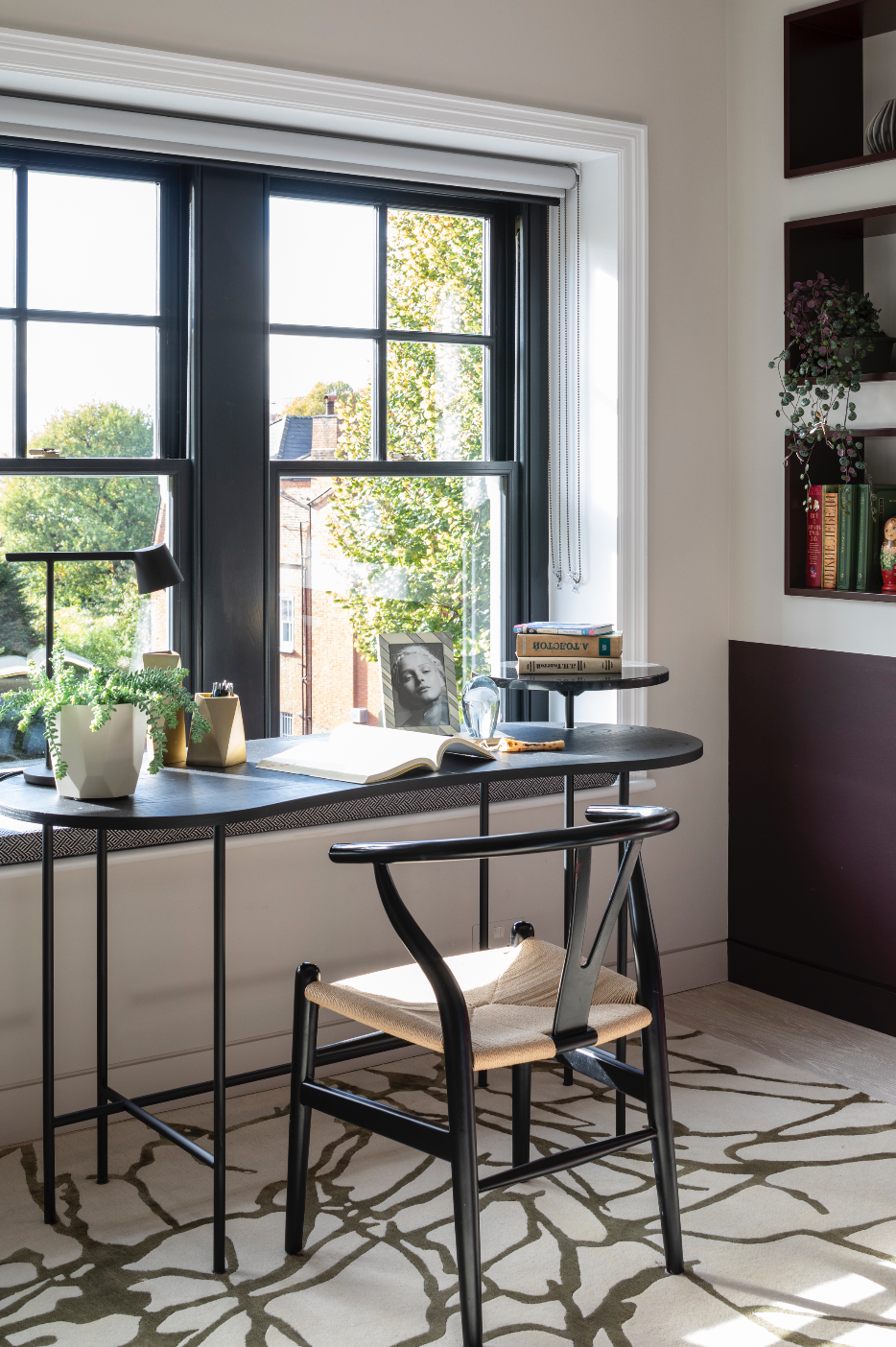 Position your desk in eye line of greenery to help bring the outdoors in