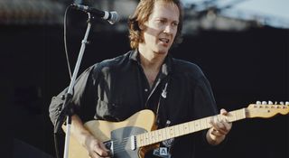 Jim Weider of the Band in 1990, playing his Telecaster live in Germany as the country celebrates the fall of the Berlin Wall.