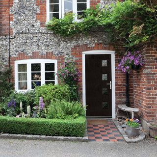 a composite front door on a cottage