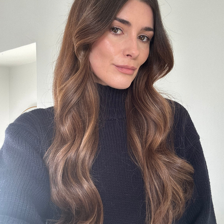 A picture of Eleanor Vousden with curled hair