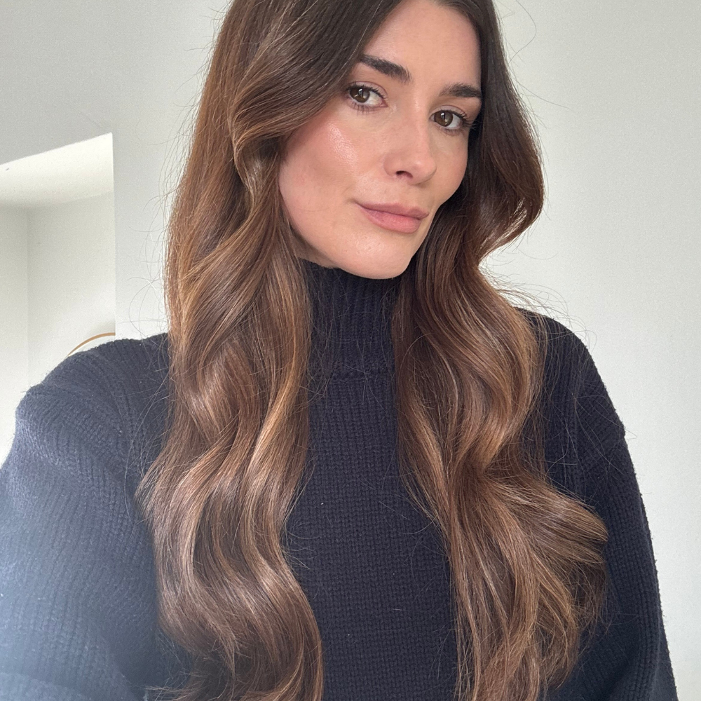 A picture of Eleanor Vousden with curled hair