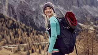 what to wear hiking: hiker smiling