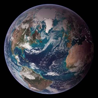 Blue Marble image of the Western Hemisphere that includes cloud cover, oceans, phytoplankton activity, topography, and city lights in the nightime part of the hemisphere.