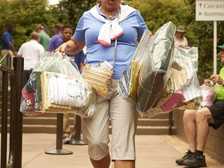 lady carrying masters merchandise