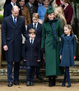 Prince William, Kate Middleton, Prince George, Princess Charlotte and Prince Louis wearing blue and green coats at church