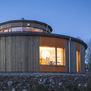 villa with glass window and night view