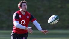 Alex Goode passes during England training session