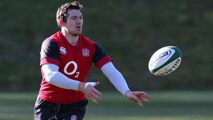 Alex Goode passes during England training session