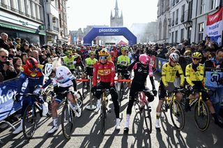 Cyclists wait for the start of the Kuurne-Brussels-Kuurne one day cycling race, 196,9 Km from Kuurne to Kuurne via Brussels, in Kortrijk on March 2, 2025. (Photo by DIRK WAEM / Belga / AFP) / Belgium OUT