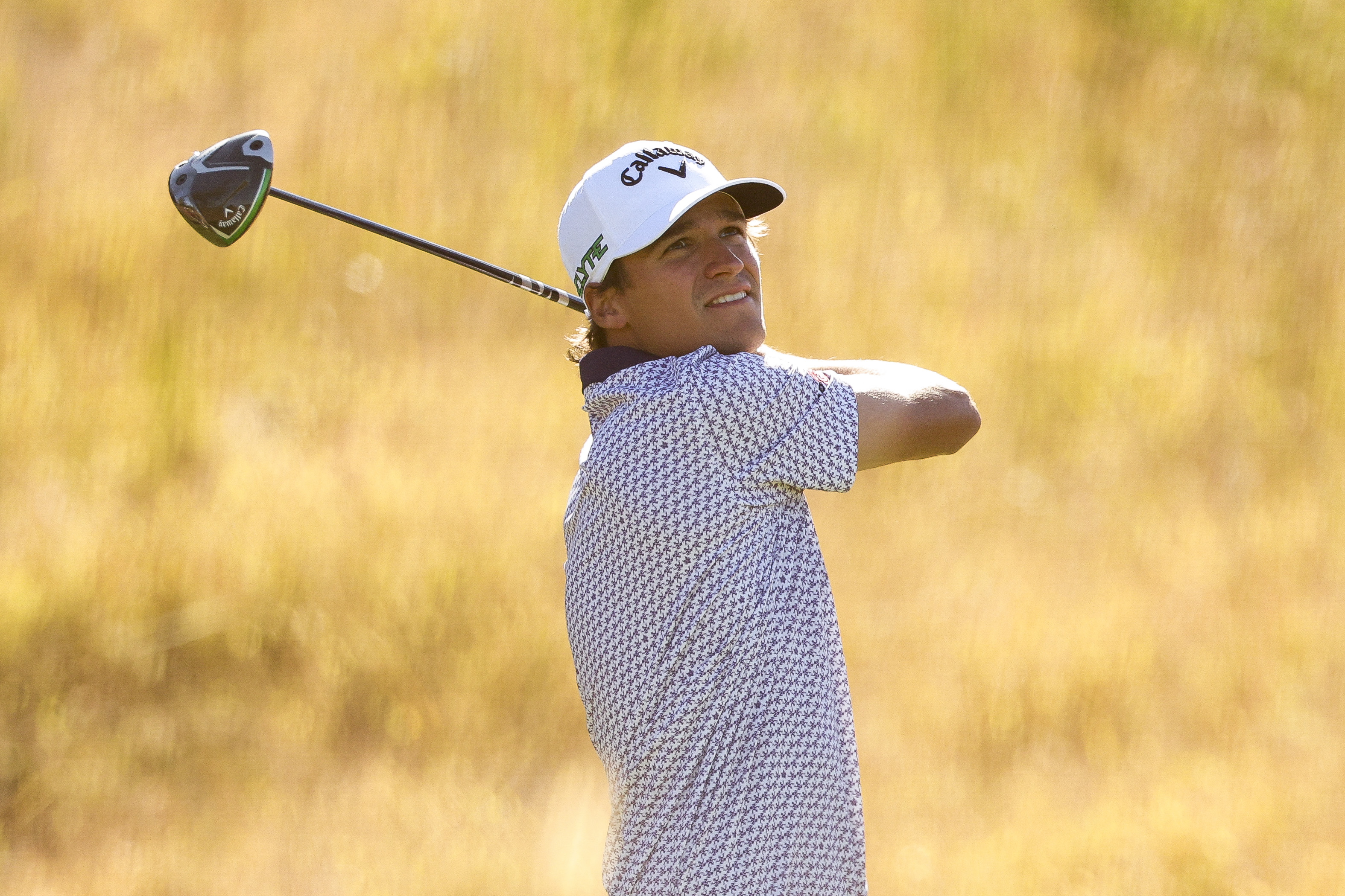 Adrien Dumont Du Chassart holds his finish on a drive