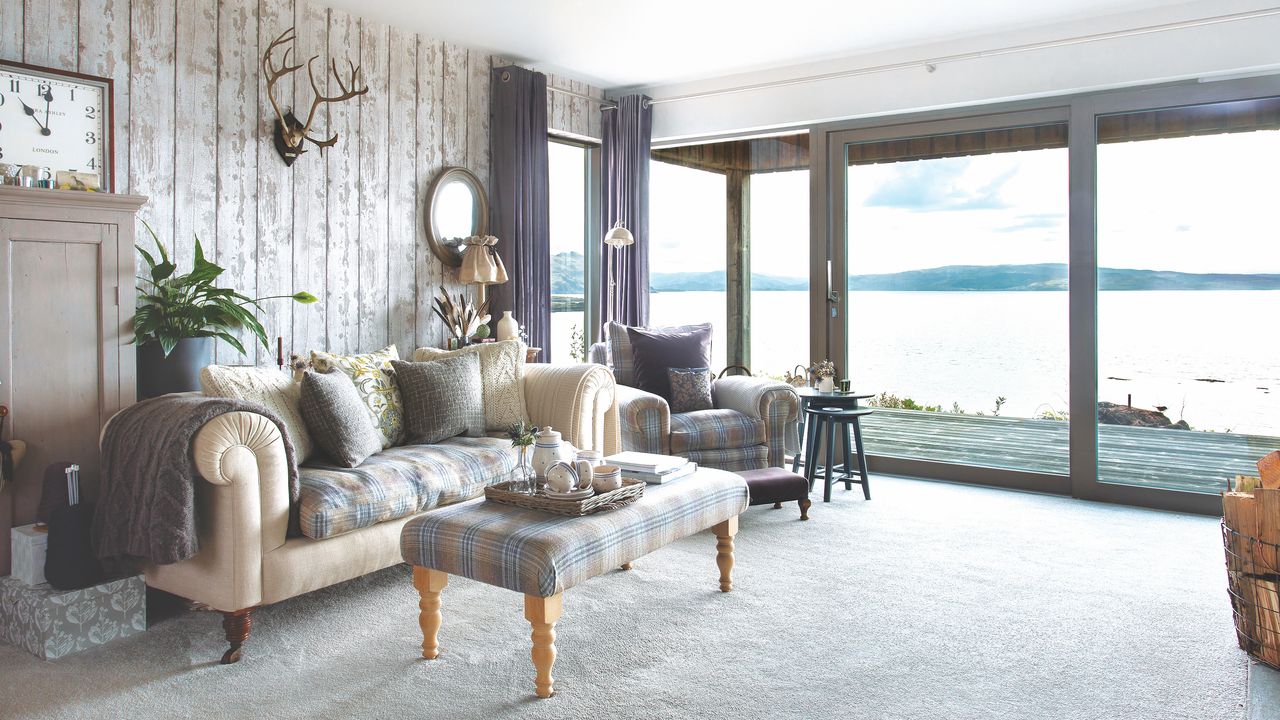 living room with grey sofa with panoramic views