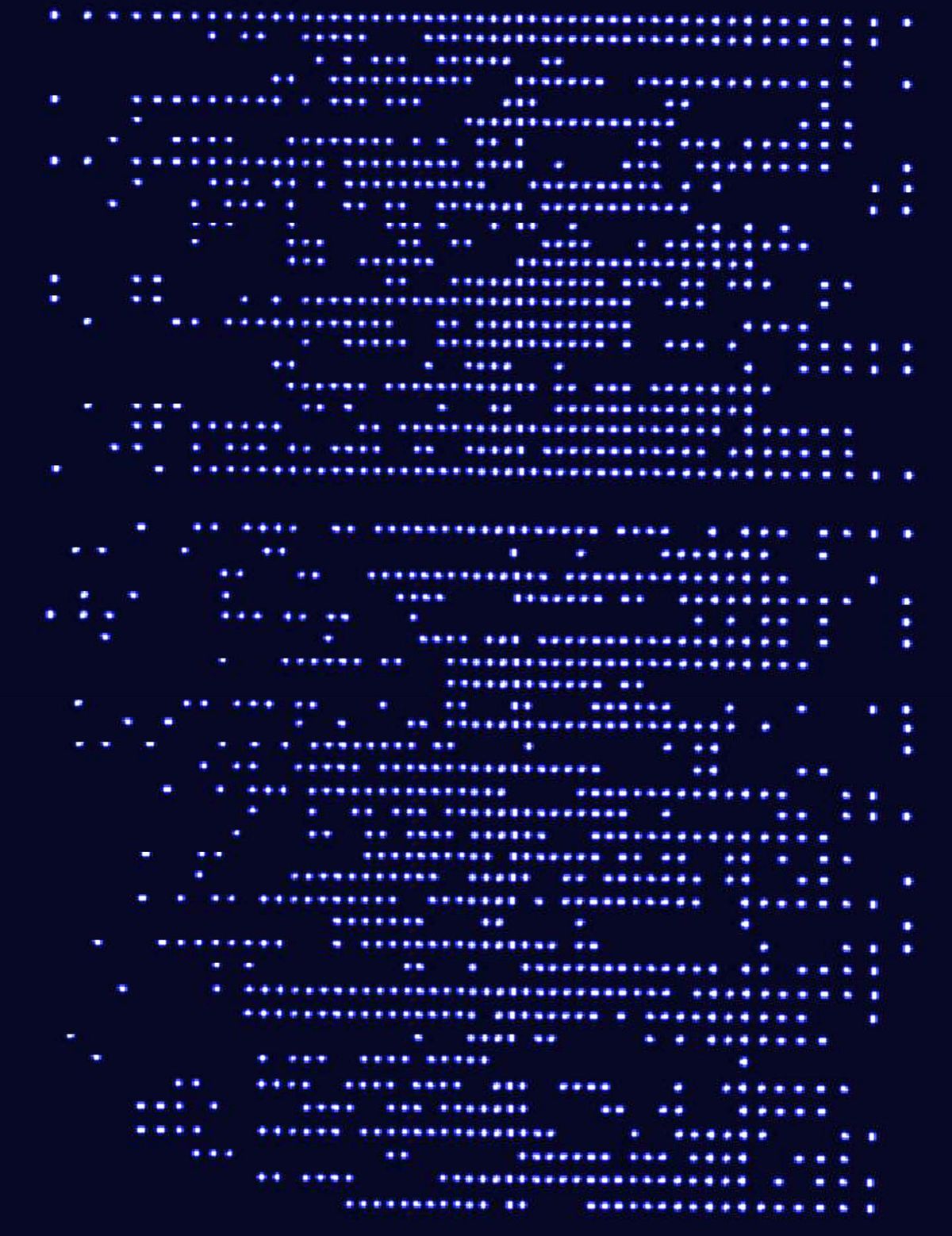 Fluorescent lights emerge from the University of Maryland quantum simulator, revealing the results of the experiment.