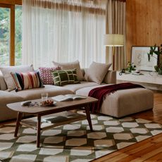 John Lewis living room with L-shaped sofa and large rug