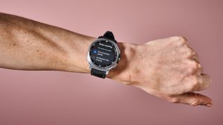 The Samsung Galaxy Watch 8 Classic on a man's wrist showing its Sleep Coaching tips.