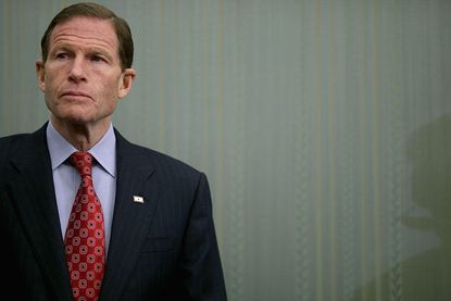 Watch Connecticut Senator Richard Blumenthal narrowly avoid a train during a railway safety press conference