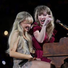 Taylor Swift and Sabrina Carpenter perform on stage together during the Eras tour