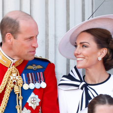 Prince William, Prince of Wales (Colonel of the Welsh Guards) and Catherine, Princess of Wales watch an RAF flypast from the balcony of Buckingham Palace after attending Trooping the Colour on June 15, 2024 in London, England. 