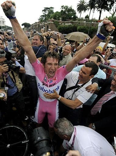 Denis Menchov unleashes his emotions at the finish line after surviving a last-kilometre crash in the time trial to win his first Giro d'Italia