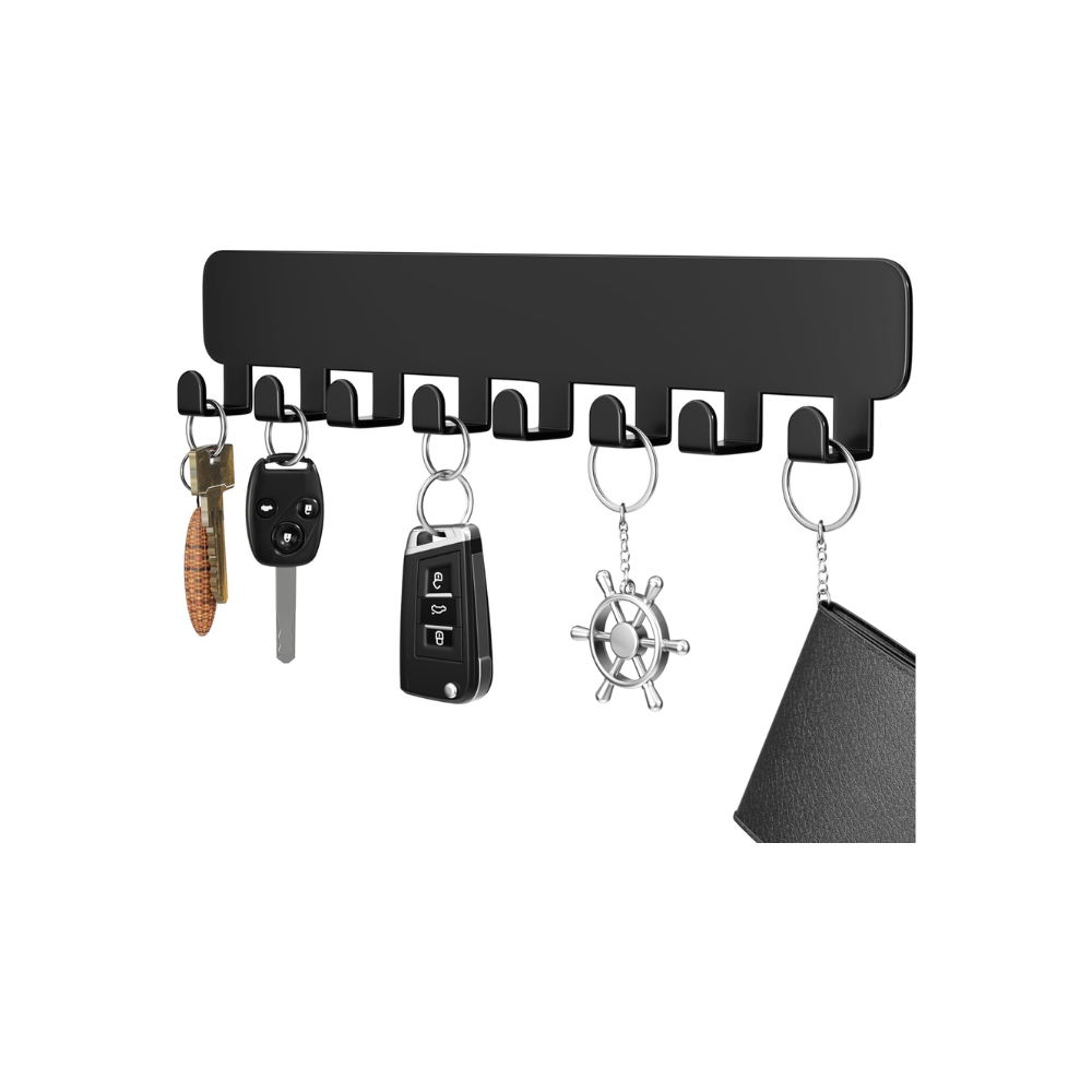 black keyholder pegs with keys hanging off the hooks