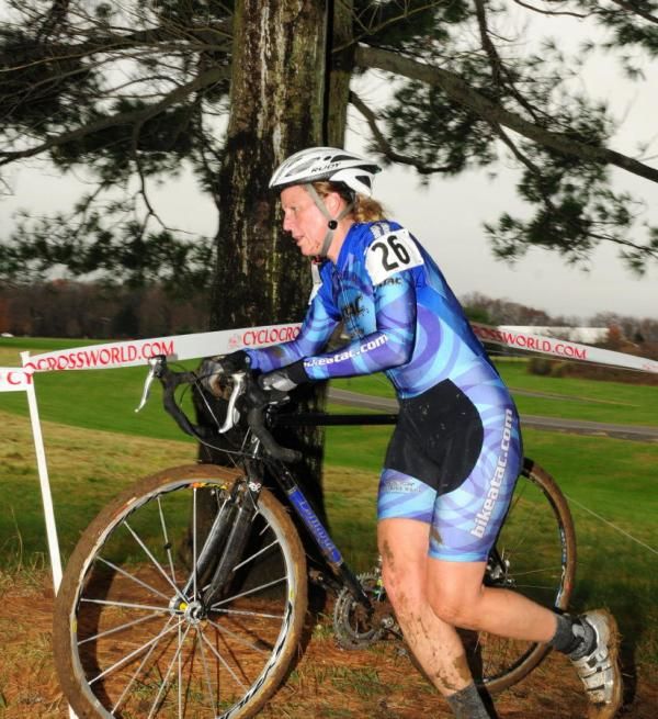 Jennifer Maxwell (ATC Sportsware) running with her bike