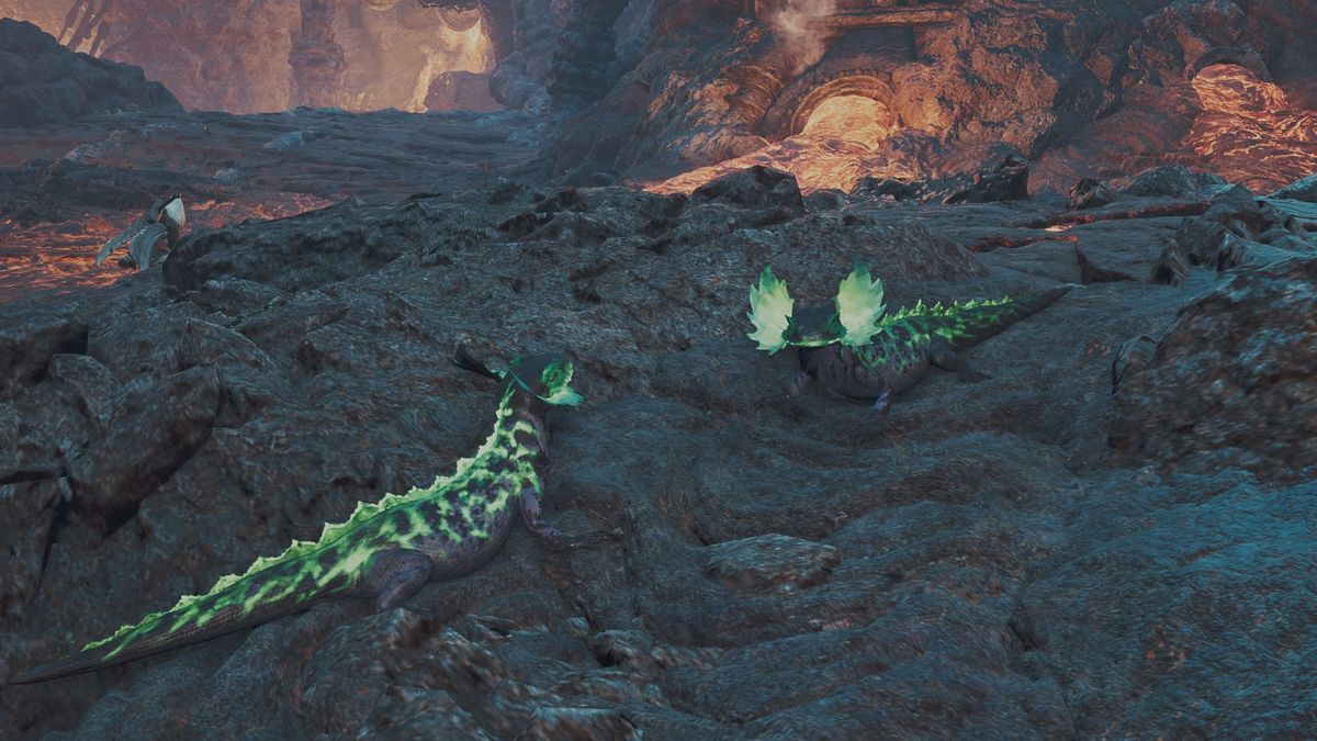 Two green and black Ember Rufflizards in Monster Hunter Wilds.