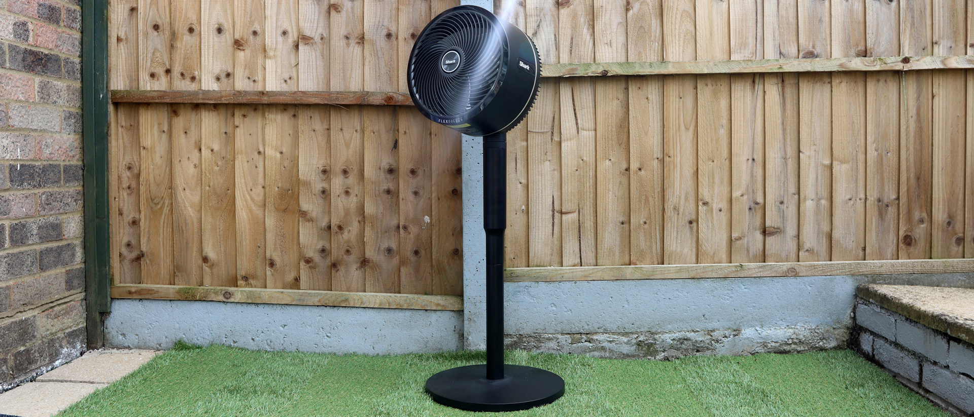 Shark FlexBreeze Portable Fan in a garden