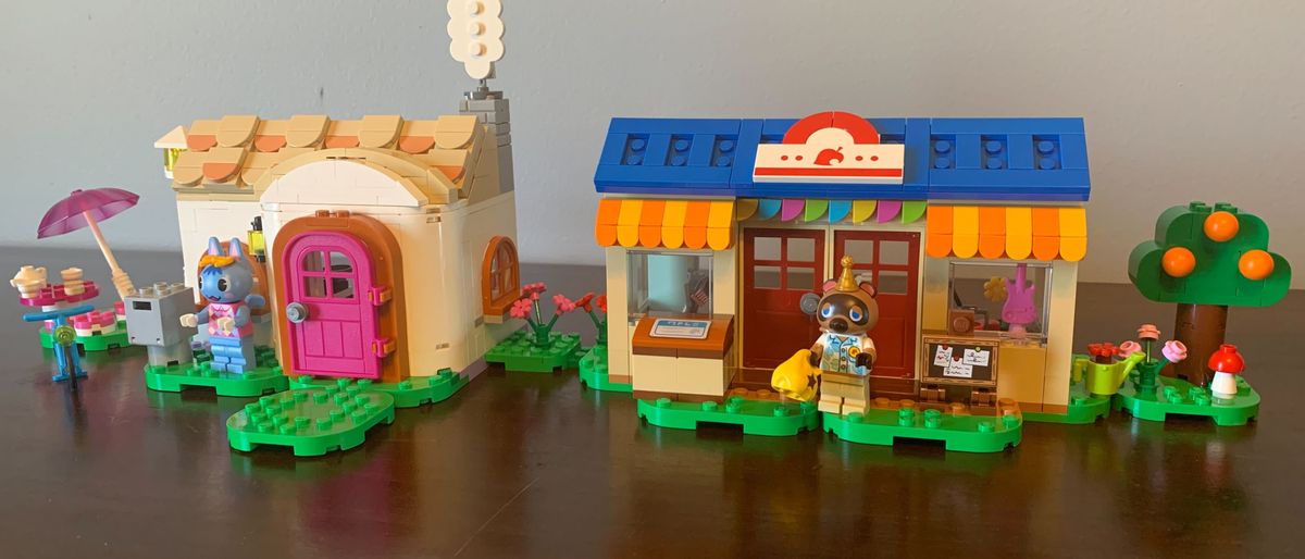 Lego Nook&#039;s Cranny &amp; Rosie&#039;s House sets on a wooden surface