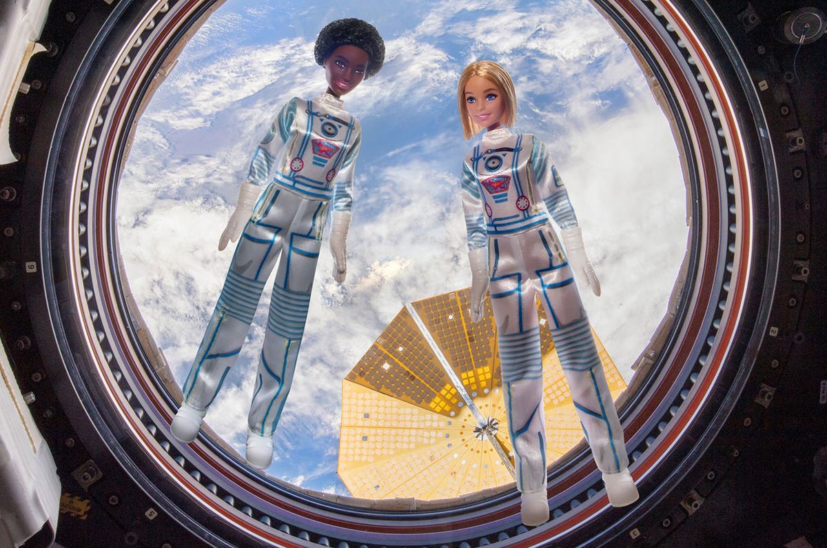 Two Barbie dolls from Mattel&#039;s Space Discovery line float on board the International Space Station in March 2022.