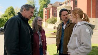 Doc, Hope, Mel and Jack standing outside a hospital looking worried in Virgin River season 6