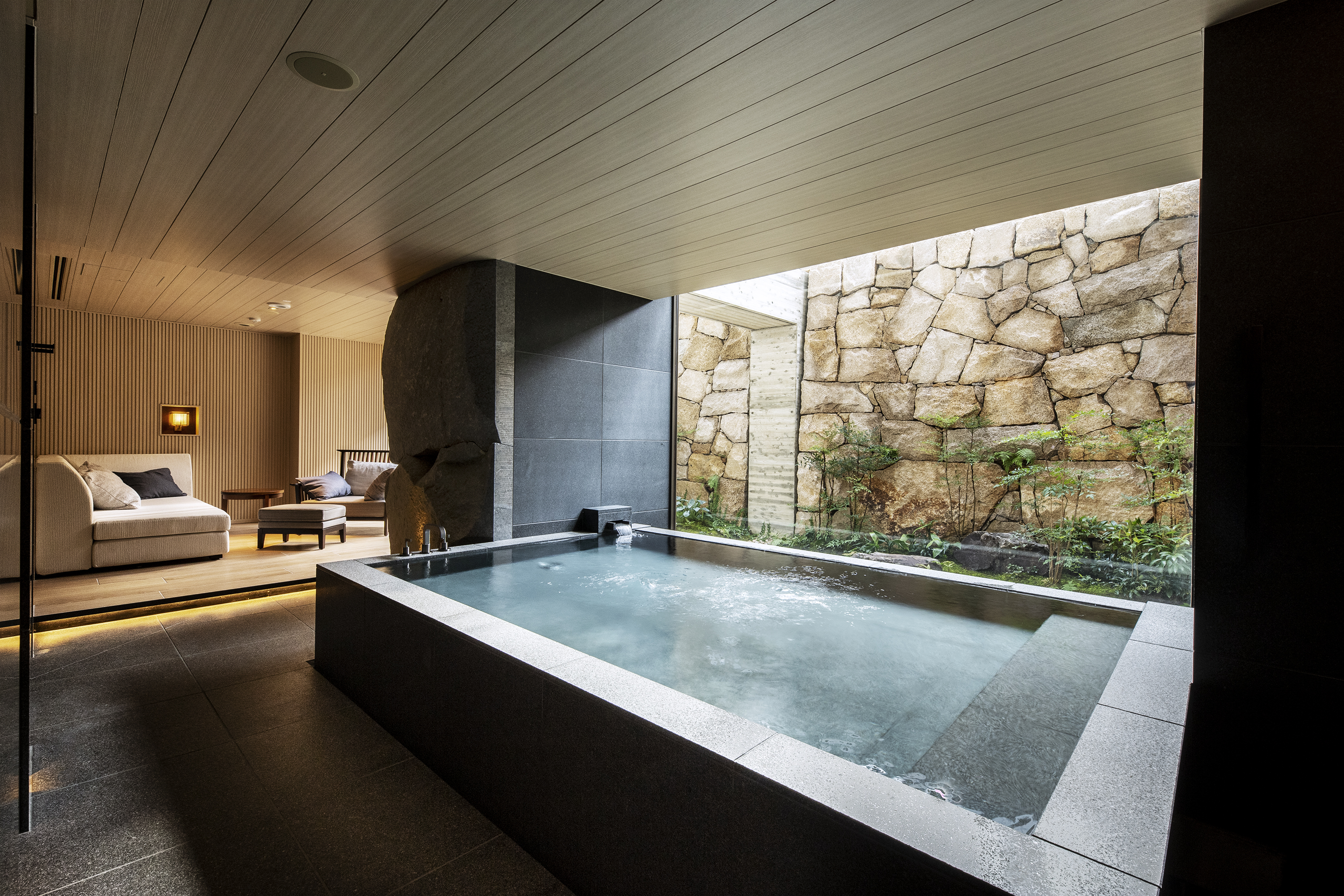 A private onsen bath inside an onsen suite at Hotel The Mitsui Kyoto