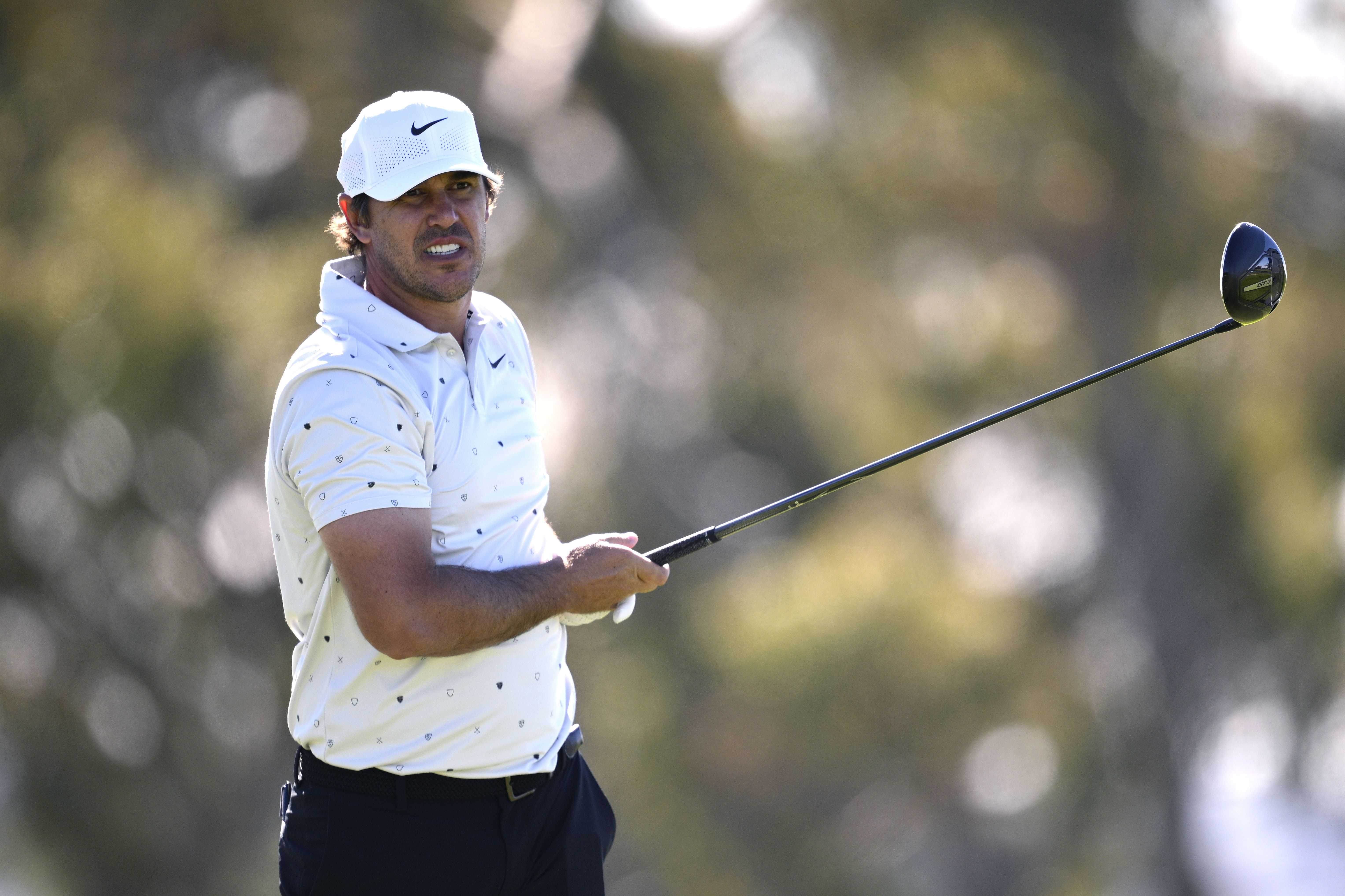 Brooks Koepka looks after a drive during a practice round ahead of the 2026 Farmers Insurance Open