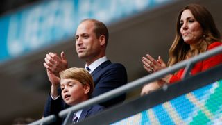 (L to R) Prince William, Prince George and Kate Middleton celebrate the win in the UEFA EURO 2020 round of 16 football match between England and Germany at Wembley Stadium in London on June 29, 2021.