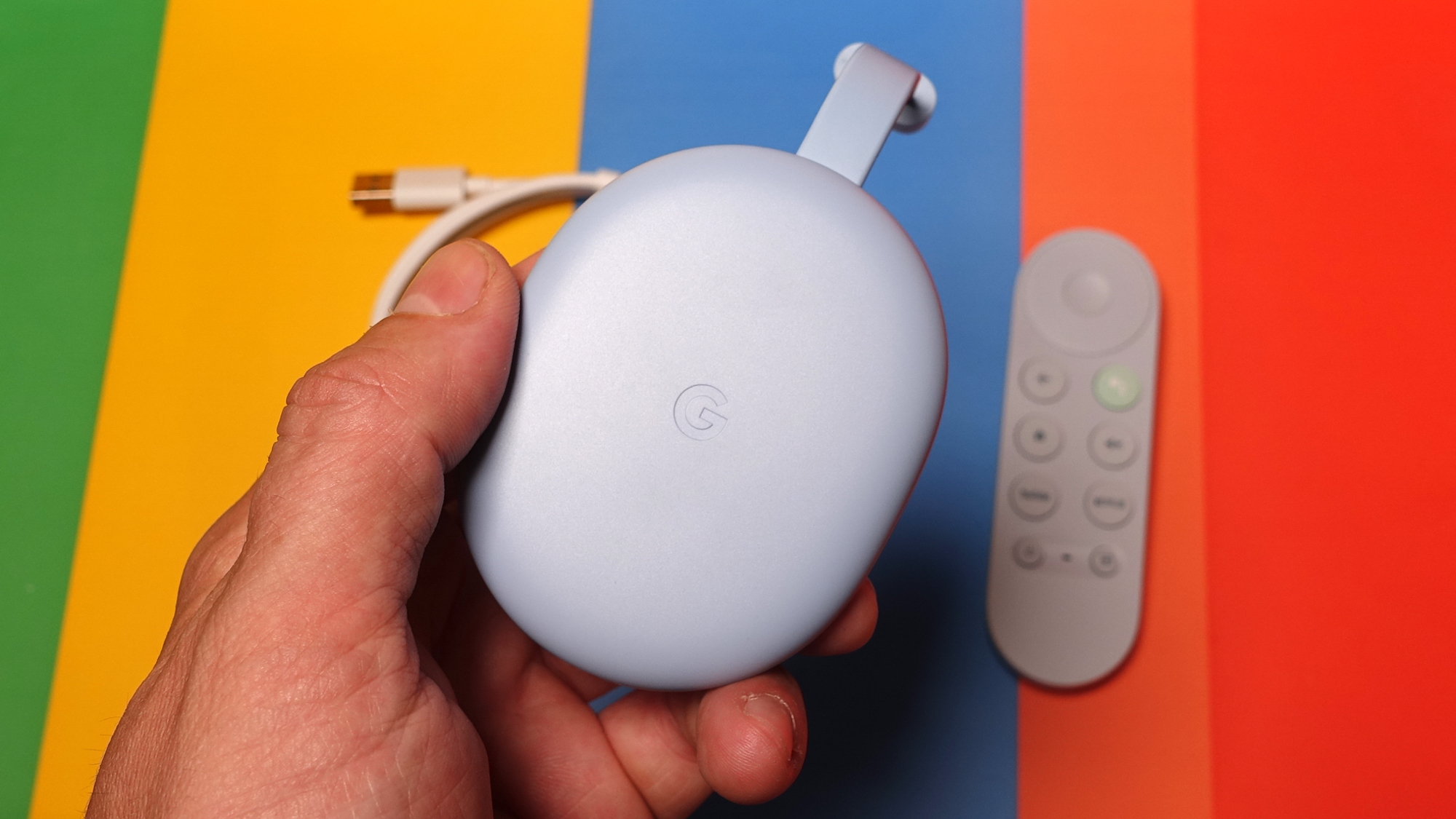 Chromecast with Google TV 4K in hand