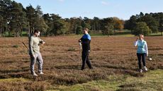 Players searching for a ball