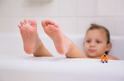 Kid in a bath