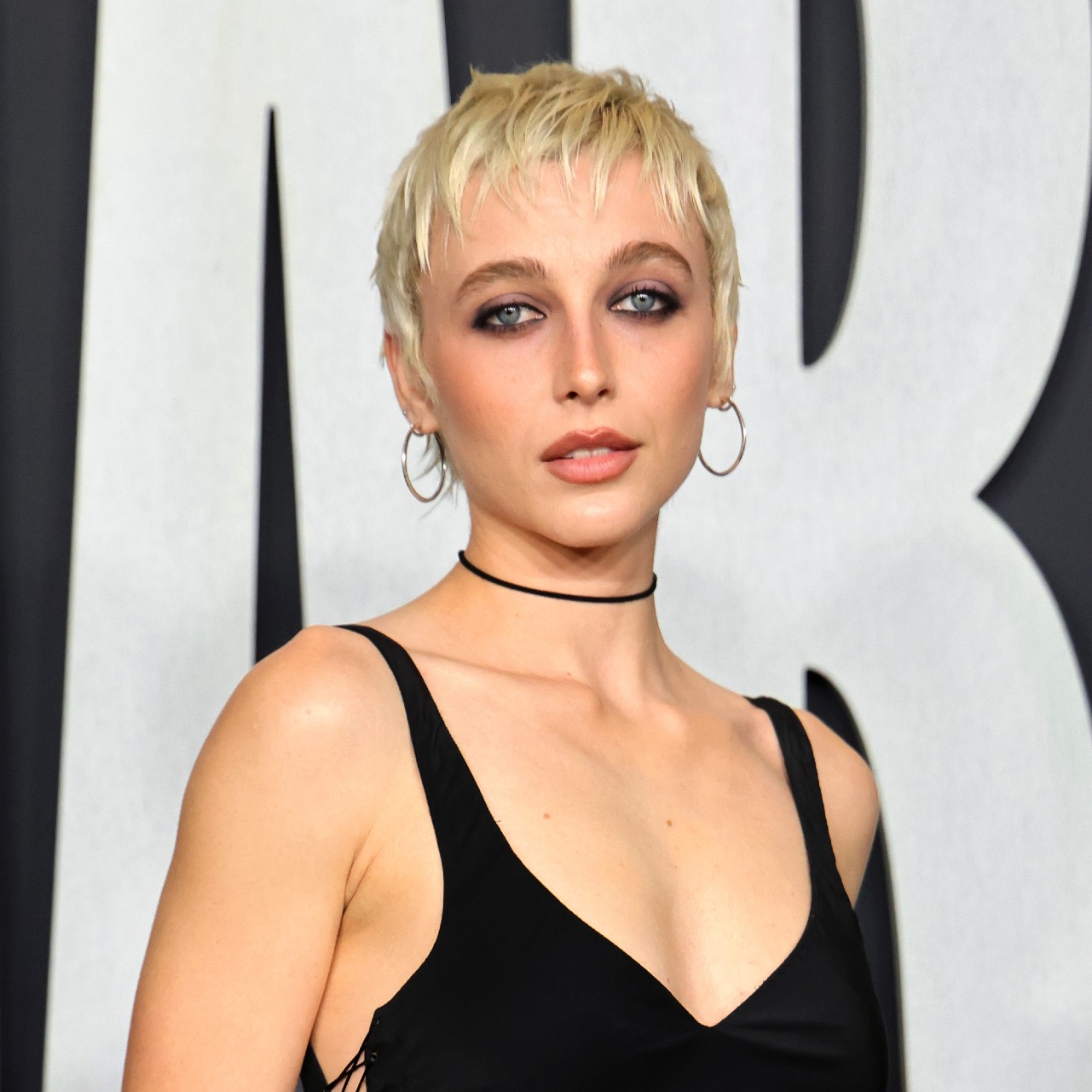 a white woman with short, blonde hair