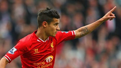 Philippe Coutinho of Liverpool celebrates